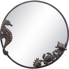 a mirror with a sea horse on it