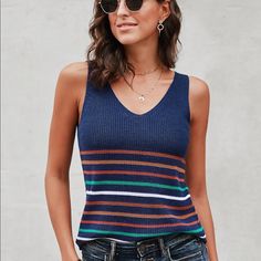 Feel Good In This Lightweight, Breathable Knit Tank Punctuated With Cute Multi-Stripe Details. Perfect For Layering Under A Jacket Or A Cardigan. True To Size V Neck Sleeveless Material: 45% Acrylic, 55% Cotton Care: Hand Wash Cold. Do Not Tumble Dry. Imported Striped Knit Tops, Casual Striped Stretch Knit Top, Casual Striped Knitted Top, Casual Striped Knit Top, Knitted Striped V-neck Top, Knitted Striped Knit Tops, Striped V-neck Knit Top For Summer, Striped V-neck Knit Top For Spring, Lilo And Stitch Shirt