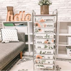 a living room with a couch and book shelf