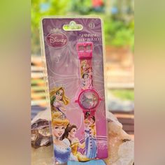 Nib A Disney Watch With Six Princess On The Band And With Cinderella On The Dial. For Ages 3+ Up. See All Photos For Additional Details. Disney Princess Rapunzel, Disney Watches, Kids Accessories Jewelry, Wooden Cheese Board, Soft Cooler, Spinning Top, Gold Charm Bracelet, Valentines Necklace, Disney Accessories