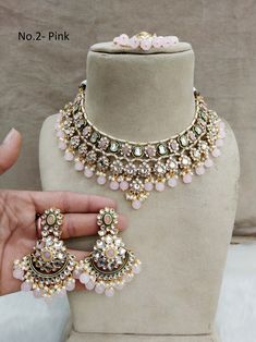 *Light Weight Kundan  necklace set with earrings and tikka. *Studded with kundan stone. *Light Weight Gold kundan necklace. * Necklace width- 1.7 inches( Included drops) *Earrings Length- 3 inches(included pearl drop) *Earrings width Size- 1.8 inches Pink Kundan Necklace For Festivals, Pink Round Jewelry Sets For Diwali, Festive Pink Jewelry Sets, Pink Round Kundan Necklace For Diwali, Pink Kundan Round Jewelry, Pink Kundan Jewelry Sets, Heavy Pink Bridal Necklace For Party, Festive Pink Round Jewelry Sets, Hand Set Pink Jewelry Sets For Festivals