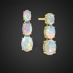 Opal oval Stud earrings, October birthstone opal Jewelry, Jewelry for women, Natural Opal Jewelry, 925 Sterling Silver earrings, AAA Ethiopian Jewelry. Product Details:- Gemstone - Ethiopian opal Stone Size - 6X4, 7X5, 8X6 MM Approx  Stone Color Available - Natural Ethiopian Opal Stone Setting - Prong Fire - Rainbow Multi fire  Birthstone - October birthstone Quality - AAA Grade Materials - 925 Sterling Silver, 14K Real Yellow Gold Type - 100% Natural Opal Shipping service - Free worldwide shipp Oval Opal Earrings For Formal Occasions, Formal Oval Opal Earrings, Oval Opal Earrings In Yellow Gold, Formal Opal Gemstone Earrings, Yellow Gold Oval Opal Earrings, Natural Opal Jewelry, Yellow Gold Opal Gemstone Earrings, Classic Opal Multi-stone Jewelry, Ethiopian Jewelry