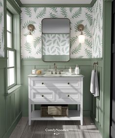 a white sink sitting under a mirror next to a green wallpapered bathroom vanity