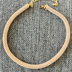 Stunning vintage Kenneth Lane adjustable, gold rhinestone rope necklace. This necklace is so beautiful! Looks extremely classy and high-quality. The length can be adjusted  on the closure, where there are multiple holes to make it longer or shorter. Total length is approx 21.5" ( can shorten as desired  approx up to 4") .All stones are intact. Each stone is prong  set and vibrant.  Has small Kenneth Lane tag on necklace. One side has a slightly different ending than the other side does not affec Gold Beaded Choker Necklace With Lobster Clasp, Rhinestone Collar, Santa Rosa Beach, Rope Necklace, Gold Rhinestone, Necklace Vintage, Collar Necklace, Necklace Gold, Jewelry Gift