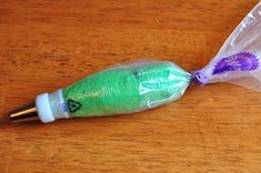 a toothbrush wrapped in plastic sitting on top of a wooden table