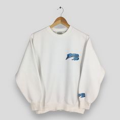 Vintage 90's Piko Surf White Sweatshirt Medium Piko Hawaiian Longboard Wear Sweater Piko Surfer Beach Pullover Piko Surfboard Jumper Size M Size On Tag :- Size M Manual Measurement :- WIDTH (armpit to armpit) :- 20" inches LENGTH (shoulder to end of garment) :- 25" inches WEIGH :- 0.41 kg Condition :- Good Condition. No holes and no stains. - Colors Might Be Different Due To Lighting. - All items are VINTAGE which show some signs of wear and tear. FEDEX EXPRESS = 3-6 business day arrived Please White Long Sleeve Throwback Sweatshirt, White Crew Neck Sweater In 90s Style, 90s Style White Crew Neck Sweater, White Crew Neck 90s Sweatshirt, White Cotton 90s Style Sweater, White 90s Crew Sweatshirt, White 90s Crew Neck Sweatshirt, 90s White Crew Sweatshirt, 90s Style White Cotton Sweater