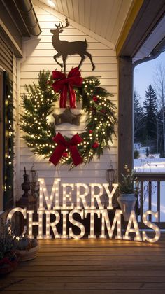 a lighted merry christmas sign on the front porch