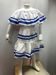 We herimos white dress with ribbons in king blue, the material is paper iba 50% cotton 50% polyester Vestido del Salvador, vestido de Nicaragua, vestido de Honduras, El Salvador dress, honduras dress, Nicaragua dress, fiesta salvadoreña Honduras Dress, North Hills, Sewing Ideas, Nicaragua, Honduras, Diy Sewing, Bell Sleeve Top, Art Collection, White Dress