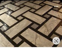 a marble floor with black and white lines on it