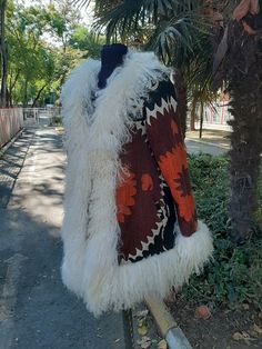 These are handembroidered vintage suzni shearling jackets. Copyrights " bemyboots " Custom Made. Material : Mangolian Sheep Shearling Trim. Vintage Samarkand Embroidery Suzani, İnterior lining is wool warm fabric. ( if like we can make with cotton interior lining ). Length : 70 cm 28 inches.#shearlingjacket #suzanijacket #womenjacket #vintage #fur White Folk Outerwear For Winter, White Folk Style Winter Outerwear, Almost Famous Penny Lane, 70s Inspired Fashion, Warm Fabric, Penny Lane, Vintage Fur, Almost Famous, Shearling Coat