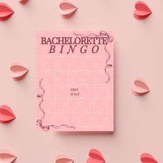 a pink bachelor party game on a pink background