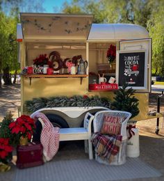 a food truck decorated for christmas with holiday decorations