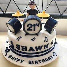 a 21st birthday cake with musical instruments on it