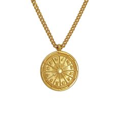 a gold plated necklace with an image of a wheel of fortune on the front