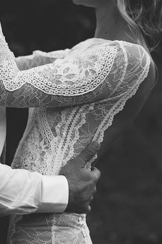 black and white photo of couple embracing each other