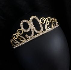 a gold tiara with the number 2000 on it