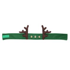 two deer antlers are attached to a green belt