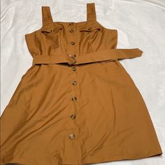 Tan/Brown Dress With Pockets On The Side Cute Outfit For Thanksgiving Never Worn Casual Brown Belted Dress, Brown Buttoned Mini Dress For Day Out, Brown Mini Dress With Buttons For Day Out, Brown Mini Dress With Buttons For Spring, Chic Brown Mini Dress With Buttons, Outfit For Thanksgiving, Cute Thanksgiving Outfits, Thanksgiving Outfit, Cute Outfit