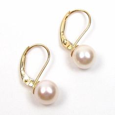 Gorgeous top quality genuine Japanese Akoya white pearl lever back earrings in 14K solid white gold or yellow gold Pearls: high quality AAA grade genuine salt water Akoya white pearls Pearl shape: round Pearl measurement: 7-7.5mm in diameter Luster: high Metal: selectable: 14K solid white gold or yellow gold Actual pearls may vary slightly. Classic Pearl Earrings With Lever Back, Classic Pearl Earrings With Lever Back Ear Wires, Formal Round Pearl Earrings With Lever Back Ear Wires, Formal Round Pearl Earrings With Lever Back, Classic White Pearl Earrings With Lever Back, Classic Hypoallergenic Yellow Gold Pearl Earrings, Classic Round Pearl Earrings With French Hook, Classic Hypoallergenic 14k Gold Pearl Earrings, Hypoallergenic Yellow Gold Pearl Earrings For Formal Occasions