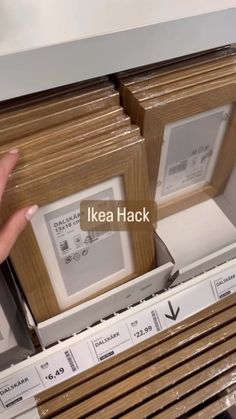 someone is pointing at some items on the shelf in their home improvement store, ikea hack