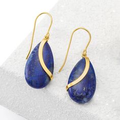 Ross-Simons - Lapis and 14kt Yellow Gold Teardrop Earrings. Rich midnight blue lapis teardrops measure 23x11.5mm and boast a glossy sash of polished 14kt yellow gold to create a bold drop design you'll love. Lapis are unique and may vary. 1/2" wide. Hanging length is 1 3/8". Earwire, lapis and 14kt yellow gold teardrop earrings. Yellow Gold Gemstone Teardrop Earrings, Blue Pear-shaped Jewelry With Polished Finish, Teardrop Lapis Lazuli Gemstone Jewelry, Teardrop Lapis Lazuli Jewelry With Matching Earrings, Lapis Lazuli Teardrop Jewelry With Matching Earrings, Sapphire Teardrop Lapis Lazuli Jewelry, Gold Teardrop Lapis Lazuli Earrings, Gold Teardrop Earrings, Lapis Earrings