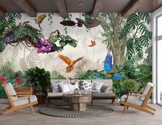 the living room is decorated with tropical wallpapers and exotic birds flying over the couches