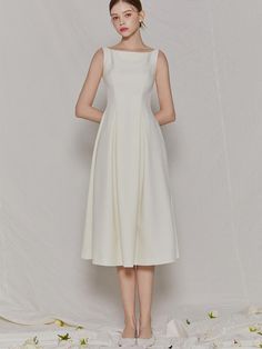 Soft and structured, this dress has refined, minimalistic silhouette. It is accentuated with wide, voluminous pleats from waist to hem.  - Simple and drapery fabric- Boatneck design and sleeveless silhouette- Flare hem with pleats throughout- Back zip fastenings- Versatile styling and easy layering Formal A-line Dress With Folds, Chic A-line Sleeveless Dress With Box Pleat, Elegant Pleated A-line Tea Length Dress, A-line Midi Dress With Pleated Back For Evening, Elegant A-line Dress With Folds, Fit And Flare A-line Pleated Dress, Classic A-line Midi Dress With Box Pleat, Workwear Midi Dress With Pleated Back And Fitted Bodice, Formal A-line Tea Length Dress With Pleated Bodice