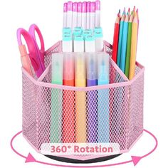 a pink pen holder filled with lots of pens and pencils on top of a white background