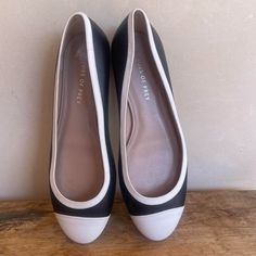 Black And White Ballet Flats With Capped Toes And Flat Heels. Purchased From Nordstrom. Retailed For $160. These Were On A Sale Shoes Rack. They Were Tried On In Store But Never Worn And Are In Excellent Condition. Sz 10w (Wide Width). **No Noted Flaws. **From A Smoke Free Environment. **See All Pictures And Measurements. **Ask Any Questions You Have. Measurements: Approximate Length: 10 3/4” Width: 3 3/4” Heels: Flats #Balletshoes #Flats #Classic #Flats #Career Black Cap Toe Heels For Spring, White Almond Toe Ballet Flats For Work, White Ballet Flats, Ballet Shoes Flat, Shoes Rack, Flat Heels, Flat Cap, Shoe Sale, Flat Shoes Women