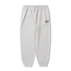 Nike Stussy Sweatpants, Gray Relaxed Fit Sports Bottoms, Gray Relaxed Fit Bottoms For Sports, Nike Gray Sports Pants, Nike Sports Pants In Gray, Nike Gray Sweatpants For Streetwear, Nike Streetwear Pants With Comfort Waistband, Gray Sports Sweatpants, Nike Pants With Comfort Waistband For Streetwear