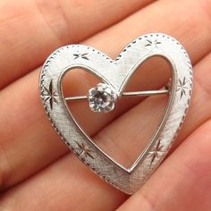 925 Sterling Silver Vintage Real White Topaz Gem Heart Pin BroochWeight: 4.4gWELCOME TO PAWN SHOPWe are an actual pawn shop and have been in business for over 25 years.Since 1990, our establishment has been serving a variety of clients by providing them with short term cash solutions and options of liquidity regarding their treasured heirlooms.Acknowledging that today′s customers are very sophisticated and are looking for a variety of investments, our acquisitions are hand-picked for our special Garnet Gem, Heart Pin, Real Turquoise, Pawn Shop, Real Pearls, Turquoise Gemstone, Pin Brooch, White Topaz, Hand Picked