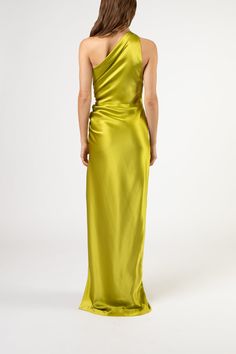 Asymmetrical one shoulder neckline gown in pure silk satin. Features a folded lapel neckline, gathers at side seam and a front side slit. Invisible zipper closure and fully lined in silk. Made in USA.   Composition: 100% silk One Shoulder Neckline, Green Gown, Taffeta Dress, Bridal Party Dresses, Invisible Zipper, Satin Dresses, Silk Satin, Pure Silk, Pretty Outfits