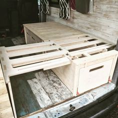 the back end of a truck with drawers in it