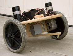 a homemade car made out of wood and electronics