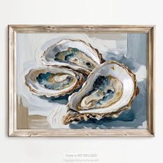 three oysters on a white background in a gold frame