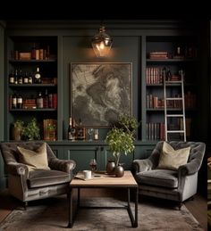 a living room with two chairs and a coffee table in front of bookshelves