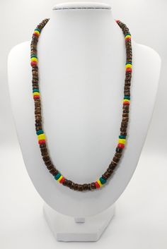 18" Rasta Brown Coconut Necklace, Hawaiian Necklace, Unisex Necklace, Beach Jewelry Material: Brown Coconut Rondelle Shack Color: Brown, Red, Yellow, Green Style: Boho Thickness: 4-5mm Clasp: Screw Make a custom order request if you need a different size and I will make it for you. ♥ Make us your one-stop shopping solution for all your bead supplies, Hawaiian bracelets, necklaces, and souvenirs. Search "Necklace", "Bracelet" or "Souvenir" in our shop, and make sure and tell all your friends abou Adjustable Multicolor Necklace For Vacation, Adjustable Multicolor Necklaces For Vacation, Red Adjustable Necklace For Vacation, Adjustable Red Necklace For Vacation, Adjustable Rainbow Necklace For Beach, Adjustable Rainbow Necklace For The Beach, Multicolor Adjustable Strand Necklace, Adjustable Multicolor Strand Necklace, Multicolor Strand Necklace As Gift