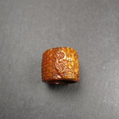 ❤This thumb ring was hand carved by Tibetan craftsmen from Tibet in 2000s. From Hepo Town, Baiyu County, the birthplace of the famous Tibetan handicrafts.It is entirely hand-carved of yak bone,lifelike details on the dragon's head and scales.❤These amazing bone beads are handcrafted by artisans from Tibet,who recycle and reuse everything in daily life and spiritual practice.Bone carvings symbolize reincarnation and the recycling of natural materials.It is an important material for Tibetan Buddhi Traditional Carved Rings For Ceremonial Occasions, Traditional Carved Ceremonial Rings, Artisan Carved Rings, Artisan Carved Adjustable Ring, Nothing Is Permanent, Buddhist Teachings, Bone Color, Water Buffalo, Dragon Pattern