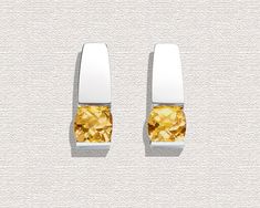 "Citrine Earrings - Argentium Silver - 2431 A contemporary, yet timeless design by award winning designer, David Worcester. PLEASE LOOK AT THE MEASUREMENTS CAREFULLY. SOME PHOTOS HAVE BEEN ENLARGED TO SHOW DETAIL, WHILE OTHERS HAVE BEEN MINIMIZED TO FIT THE FRAME. ACTUAL SIZE CANNOT BE DETERMINED FROM THE PHOTOGRAPHS. Cast in Argentium 960 premium quality 100% recycled silver, these earrings are specially processed for tension setting. They measure 18mm x 7mm (3/4 x 1/4\") inches, and hold 6mm a Classic Citrine Earrings, Yellow Rectangular Citrine Jewelry, Silver Citrine Gemstone Earrings, Silver Citrine Earrings For Gift, Yellow Faceted Citrine Earrings, Citrine Jewelry, Citrine Earrings, Shades Of Teal, November Birthstone