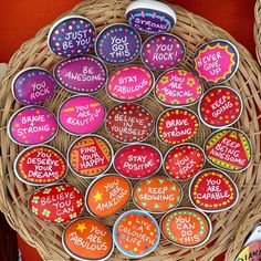 a basket filled with lots of colorful magnets