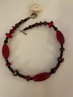 This necklace is 18" long and made with an assortment of glass, crystal and trade beads. The long red bed is 30mm. The toggle is silverplate. Red Bed, Red Bedding, Necklace Red, Long Red, Trade Beads, Pittsburgh Pa, Glass Crystal, Black Crystals, Creative Inspiration