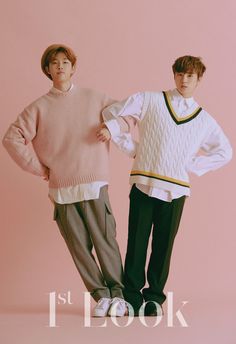 two young men standing next to each other in front of a pink background with the words 1st look on it