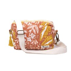 an orange and white bag with a flower pattern on the front, one shoulder strap