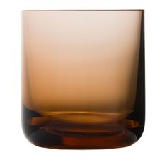 a brown glass vase sitting on top of a table