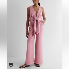 Express Pink Satin Jumpsuit Size Medium Brand New With Tags Length 58.5” See Photos For Details Chic Spring Pantsuit With Tie Waist, Elegant One-piece Jumpsuit For Work, Elegant One-piece Jumpsuits And Rompers For Work, Feminine V-neck Jumpsuits And Rompers For Night Out, Elegant Pink Jumpsuits And Rompers For Spring, Feminine V-neck Jumpsuit For Night Out, Feminine Fitted Jumpsuit For Formal Occasions, Feminine Fitted Jumpsuits For Workwear, Feminine Fitted Jumpsuits And Rompers For Formal Occasions