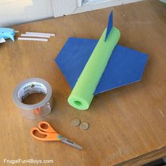 the supplies needed to make this paper airplane craft