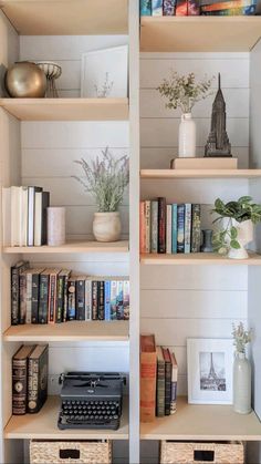 the bookshelves in this room are filled with books