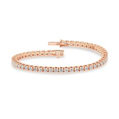 The Essential Tennis Bracelet exemplifies the magnificence of your beauty. Its string of glistening diamonds radiates luxury from every angle, and its minimalistic design makes you shine in all your glory. The diamond bracelet has a secured top GB lock that ensures the bracelet is secured and feels comfortable. Everyday Luxury Flexible Diamond Bracelet, Rose Gold Everyday Luxury Tennis Bracelet, Rose Gold Tennis Bracelet With Vvs Clarity, Classic Flexible Cubic Zirconia Diamond Bracelet, Rose Gold Diamond Tennis Bracelet With Prong Setting, Elegant Rose Gold Diamond Bracelet With Prong Setting, Dazzling Rose Gold Bracelet For Formal Occasions, Classic Rose Gold Tennis Bracelet For Formal Events, Rose Gold Diamond Tennis Bracelet Brilliant Cut