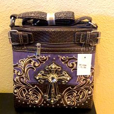 Beautiful Western Bag With Crossbody Strap . In Front You Can See Cross . Around Is Embroidery And Embossed Studs Also Have Lining Inside And One Zipper Inside And One Zipper Outside. Very Sturdy.Can Use For Any Occasion. Brand New. It Also Comes In Pink &Turquoise. Color V Nice Looking. Embroidered Purple Shoulder Bag For Everyday Use, Purple Embroidered Bags For Everyday Use, Embroidered Purple Shoulder Bag For Daily Use, Purple Embroidered Bag For Gift, Purple Embroidered Shoulder Bag For Daily Use, Purple Embroidered Everyday Bag, Everyday Purple Embroidered Bags, Everyday Use Purple Embroidered Bags, Purple Satchel Shoulder Bag Gift