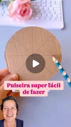 a woman is holding a piece of cardboard with a toothbrush in it and the words pulseria super facii de fali de fazer